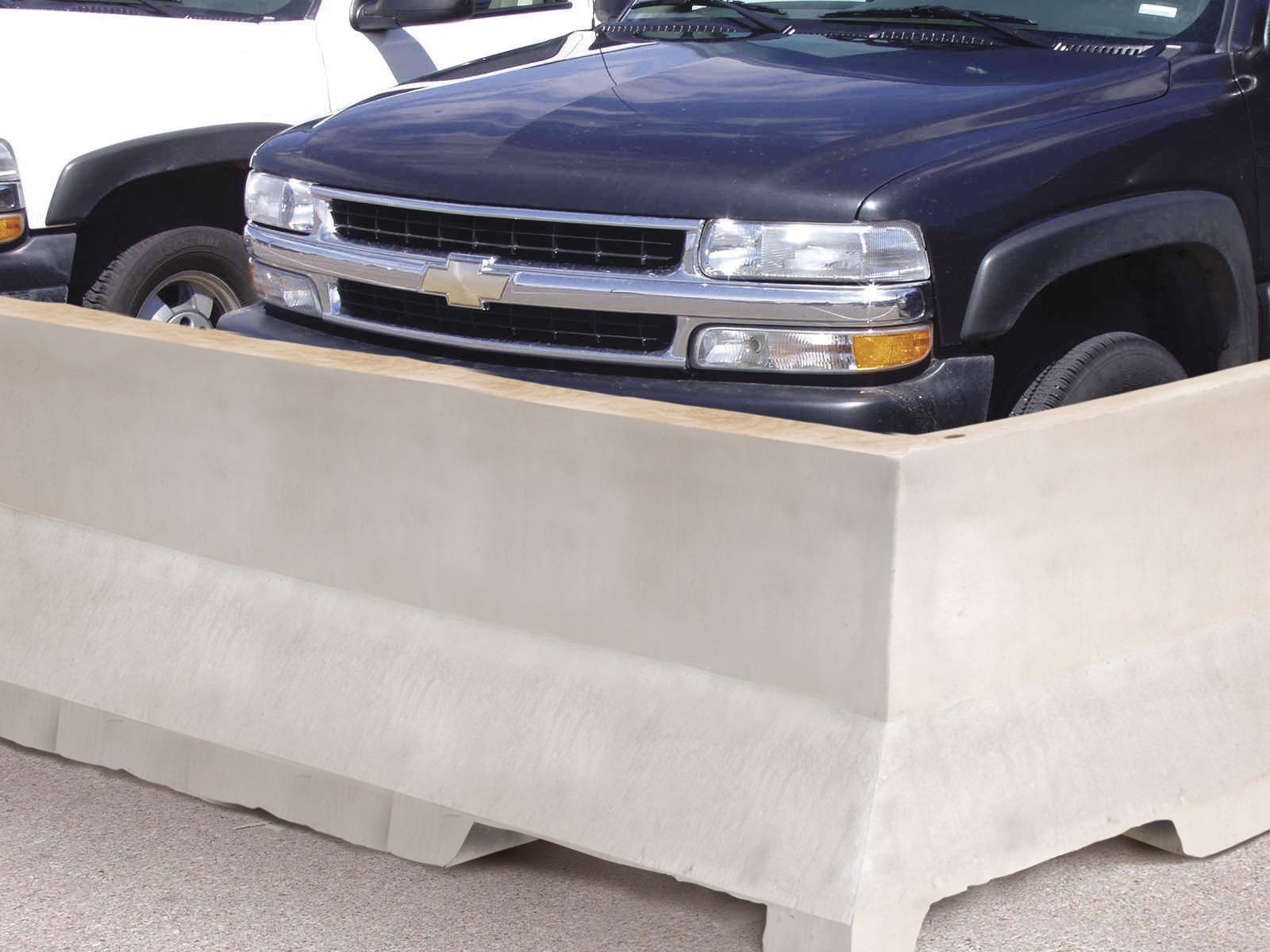 Precast Concrete Traffic Barrier In Parking Lot